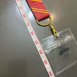 1 Harry Potter Lanyard with Clear ID Holder
2 Gryffindor Lanyard w/Clip/ID Pouch